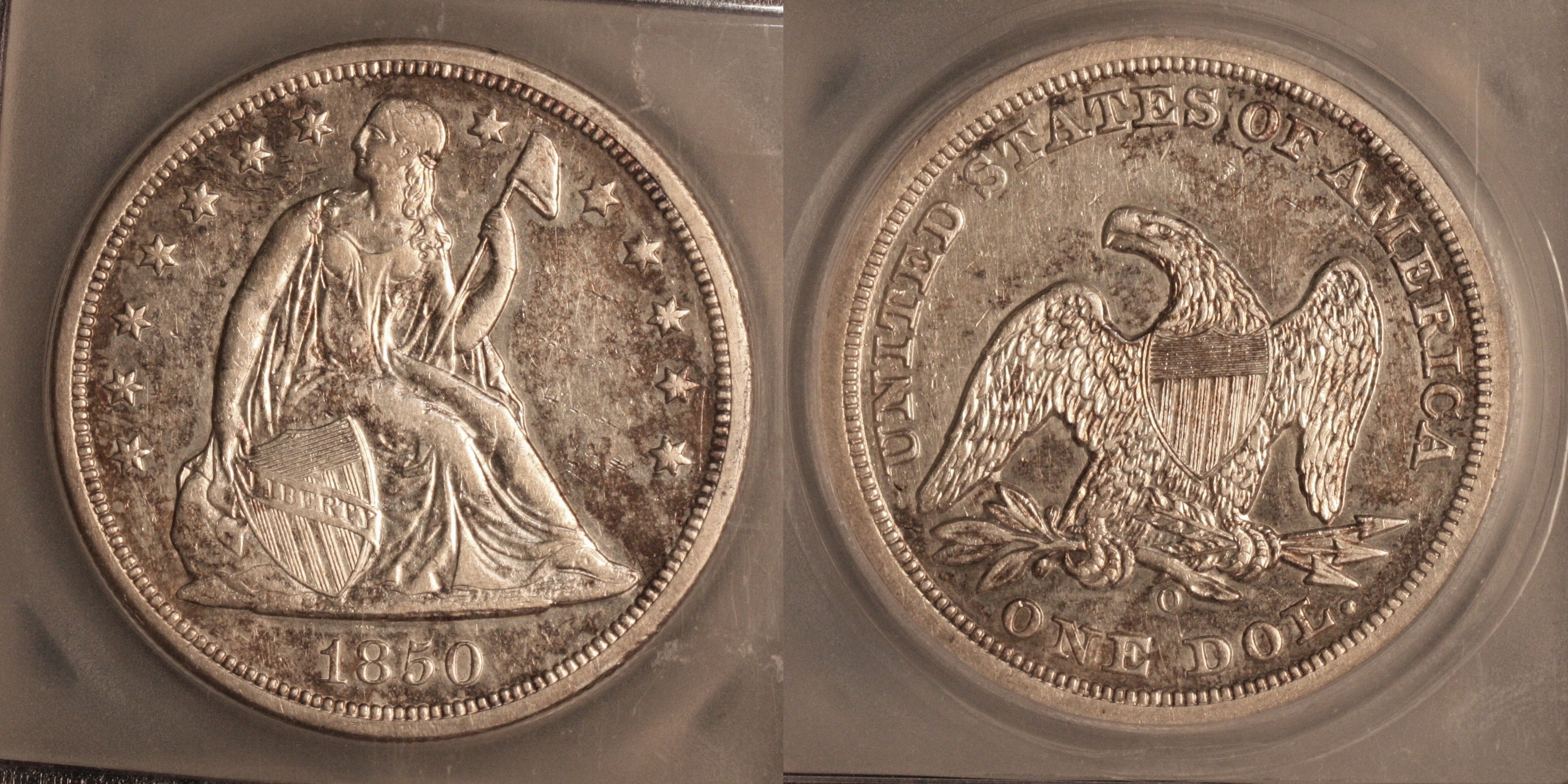 1850-O Seated Liberty Silver Dollar ICG AU-50 camera