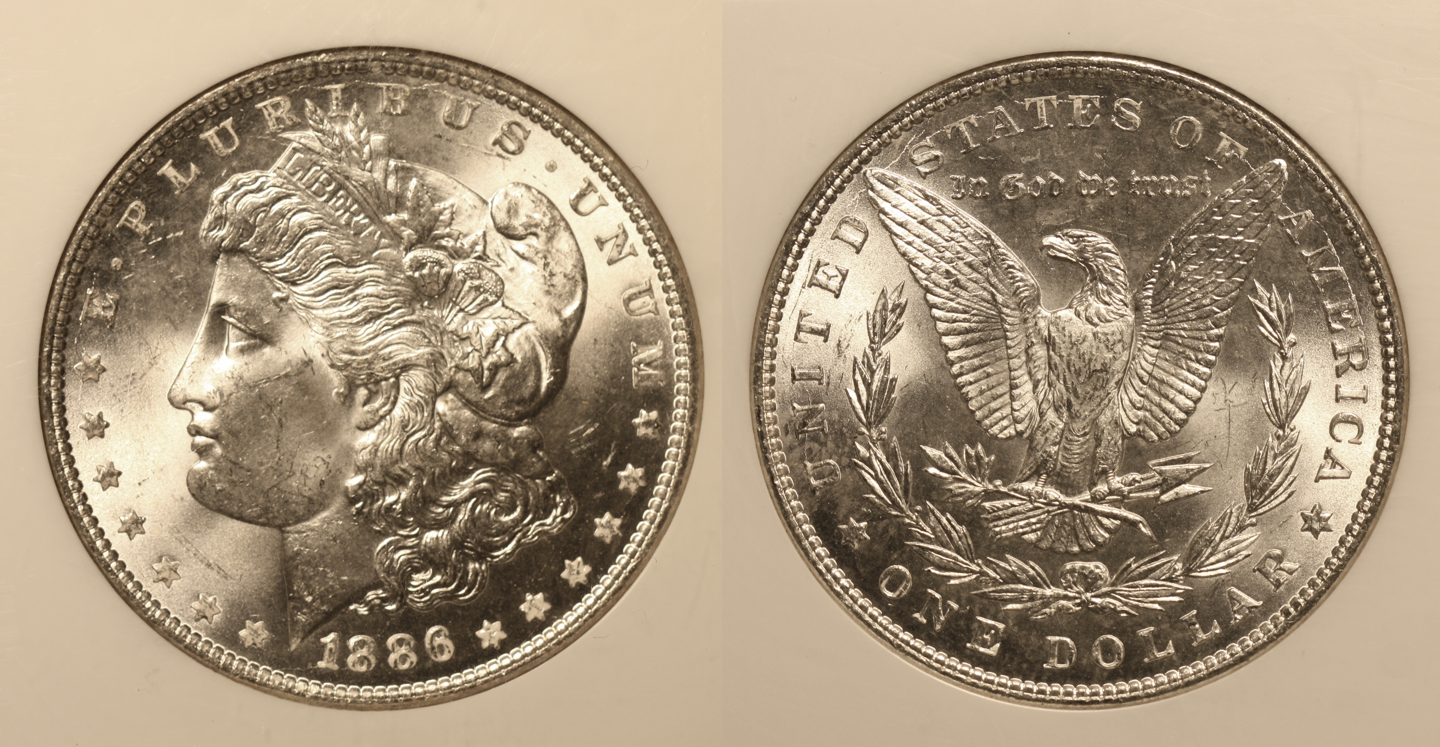 1886 Morgan Silver Dollar NGC MS-64 camera