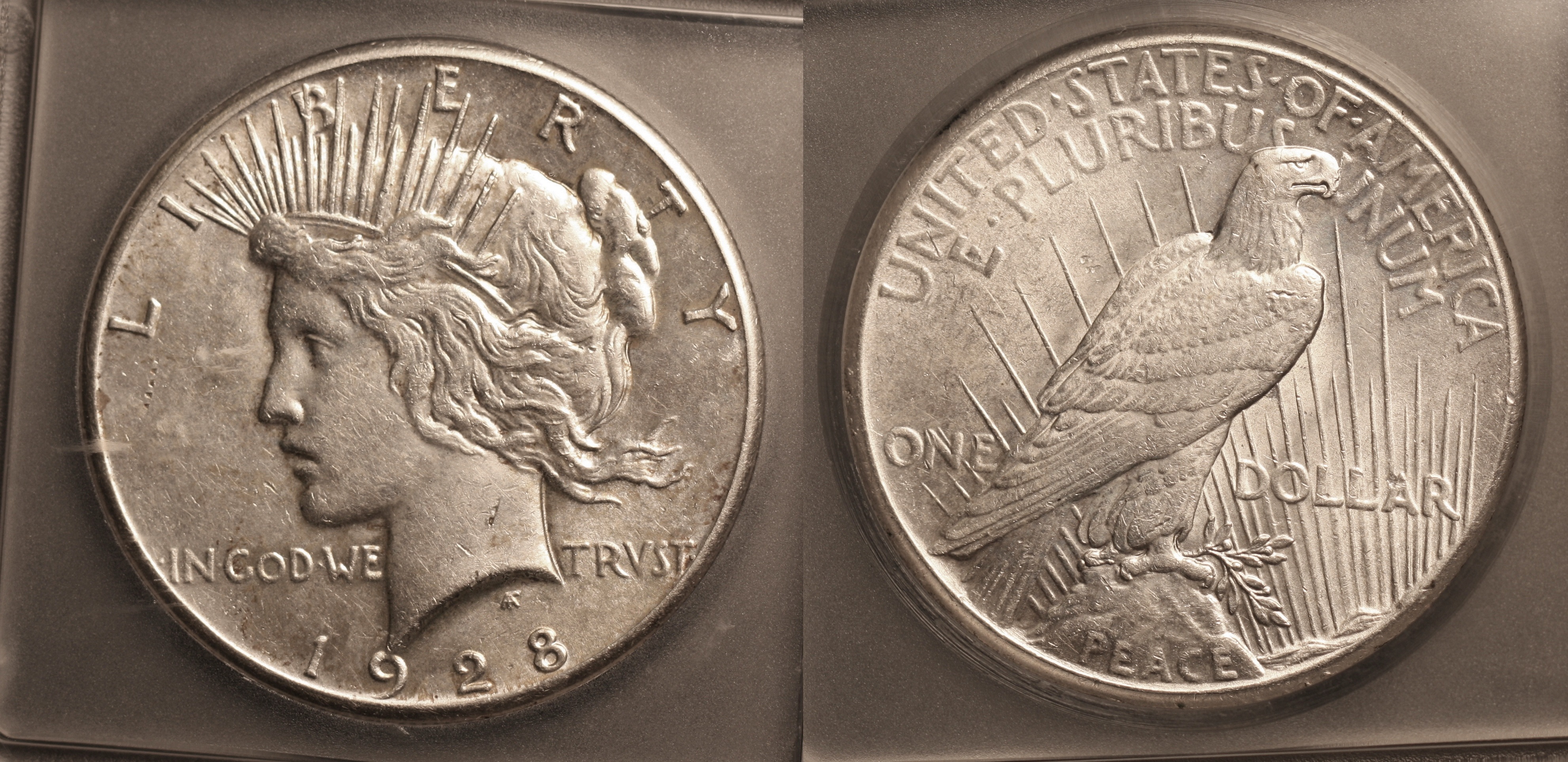 1928 Peace Silver Dollar ICG AU-58 camera