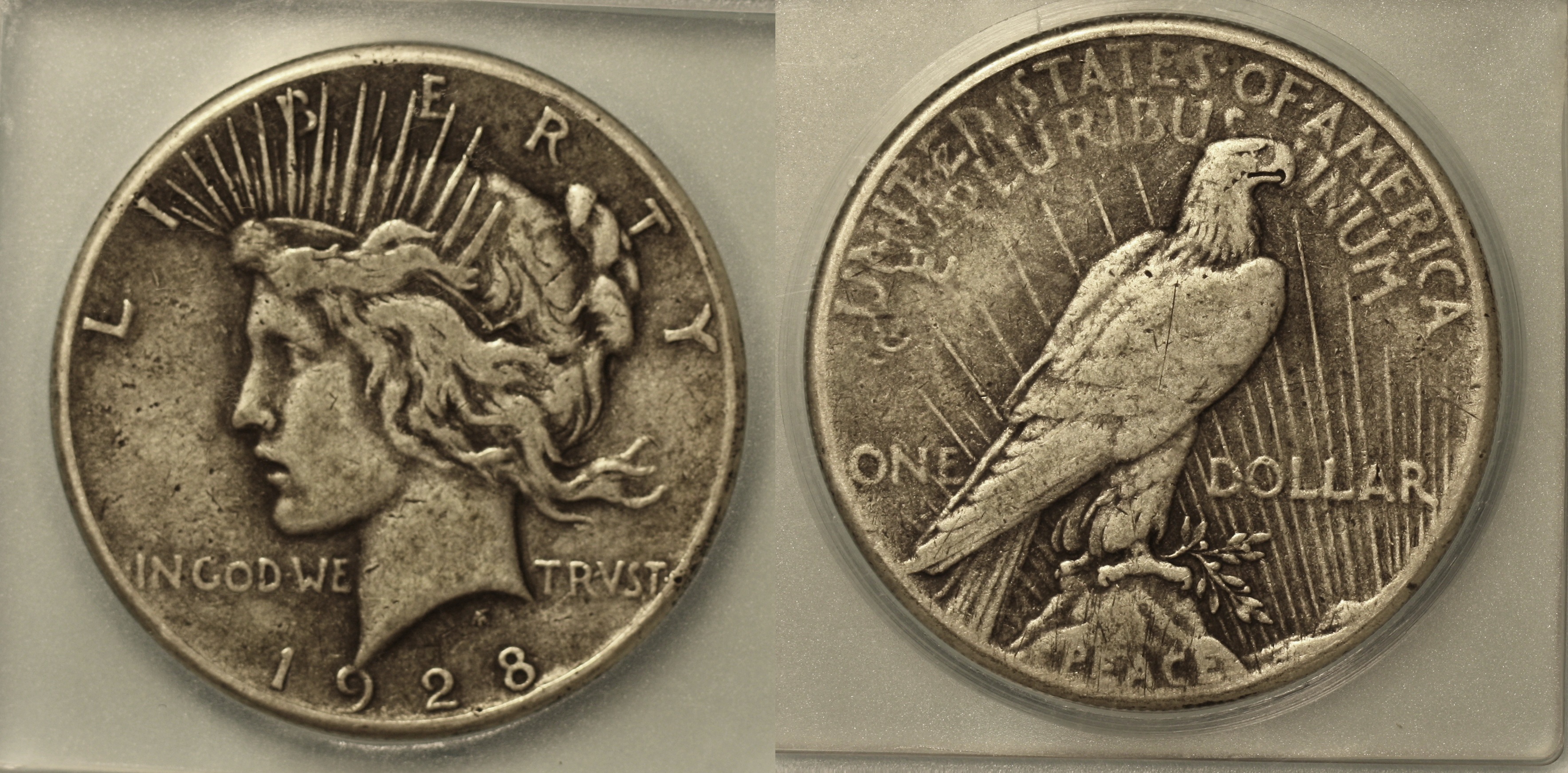 1928 Peace Silver Dollar ICG Fine-12 camera