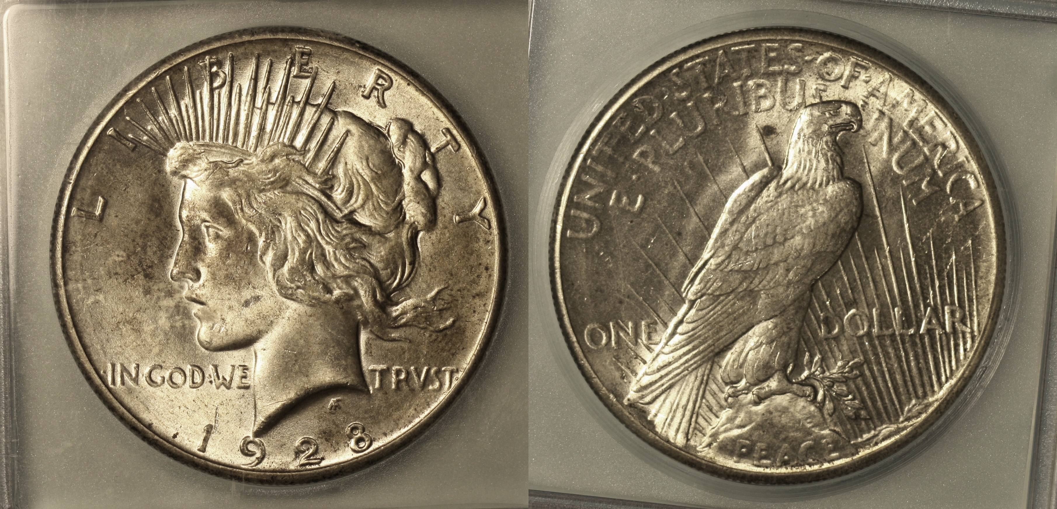 1928 Peace Silver Dollar ICG MS-63 camera