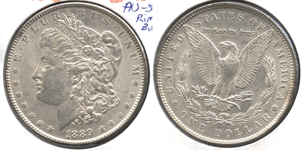 1889 Morgan Silver Dollar AU-50 #ae Rim Bump
